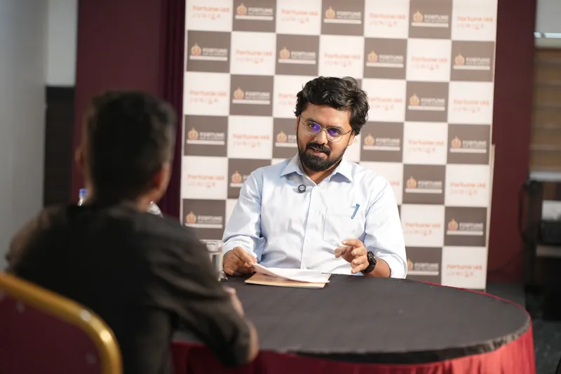 Dilip K Kainikkara, IAS interviewing a Fortune IAS Junior student